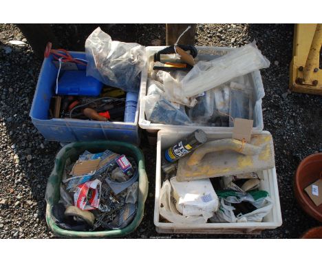 Four boxes of misc. cable ties, nail gun nails, tools etc.