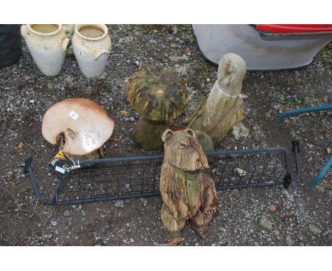 Wooden sculptures to include 3 mushrooms a/f., owl and bear, together with a Volkswagen dog guard.