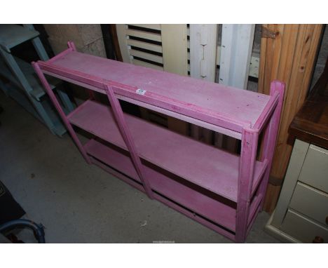 A pink 3 shelf Storage unit, 46" wide x 9" deep x 32" high.