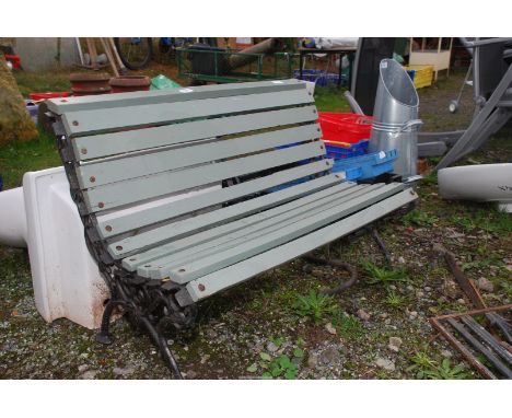 A child's iron framed garden bench, 33' long x 21" high.