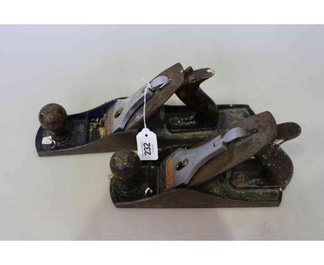 Two vintage Stanley smoothing planes.