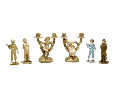 A pair of Royal Worcester double figural candlesticks,Rd. no. 39964, model 1125, 22cm high, together with four further figure