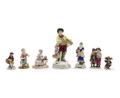 A collection of twelve Continental porcelain figures, including a gardener and child, musicians, etc., some by Samson, Sitzen