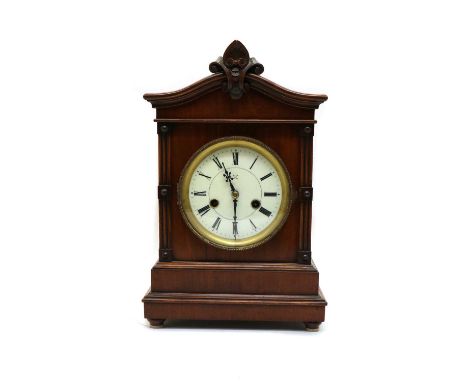 A German walnut mantel clock,striking the half hours on a gong40cm highCondition report: Both barrels wind so springs ok, wil