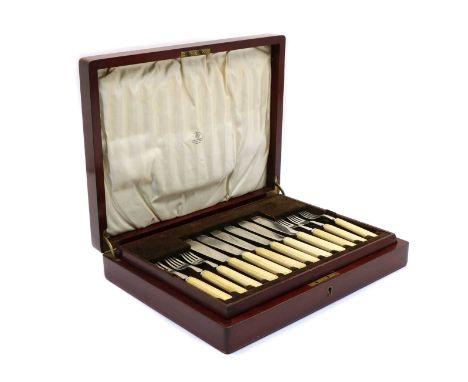 A silver Mappin & Webb canteen, Sheffield 1925, comprising twelve fish knives and forks, with ivory handles (24)IMPORTANT NOT