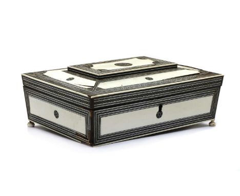 A Vizagapatam ivory sewing box, the interior with mirror, pin cushion and thread winder, 25.5cm wide 18.5cm deep 8.5cm highIM