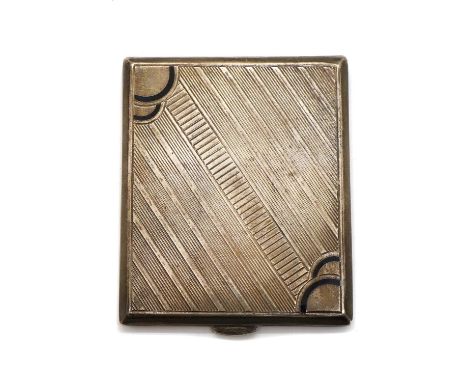 An Art Deco silver compact,by Alfred Dunhill &amp; Sons, London 1936, the top with enamelled corners, 8.8cm wide, 4oztConditi