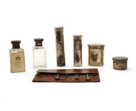 A leather cased vanity set, by Aspreys, London 1904, the leather case with silver and silver-mounted brushes, bottles and jar