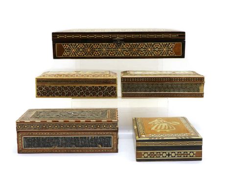 A Persian inlaid box, inset with ivory banding, the lid and sides with white metal panels depicting figures within a floral b