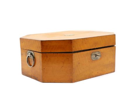 A satinwood sewing box, early to mid-19th century, of octagonal form, the lid with an engraved panel, opening to reveal a red