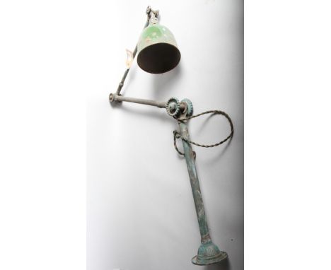A gilt metal wall / desk lamp 