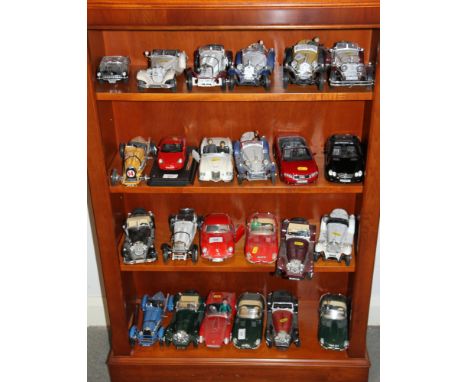 A collection of unboxed Burago scale models of sports cars, twenty-four approx 