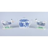 An early 19th century pearlware teapot, transfer decorated "Willow" pattern, and a pair of "
