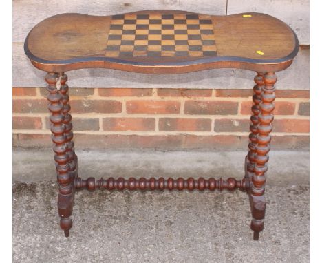 A Victorian occasional table with central chessboard, on bobbin turned supports 