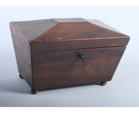 A 19th mahogany century two-division tea caddy, 8 1/4" wide, and a Black Forest carved folding wall shelf, 11" wide 