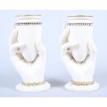 A pair of late Victorian Royal Worcester Parian ware spill holders, in the form of a cuffed jewelled