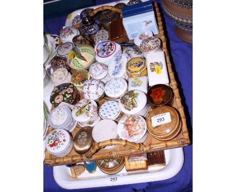 A collection of ceramic and other pill boxes 