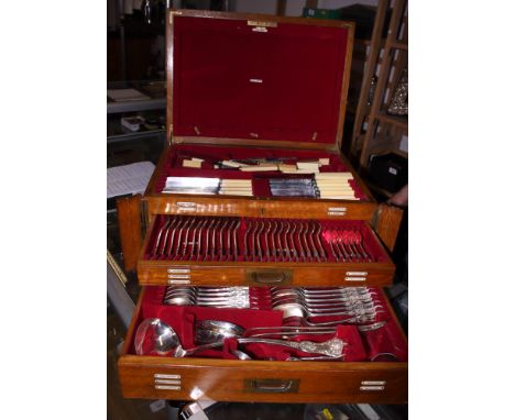 A mid Victorian table top three canteen with silver plated flatware and a two-handled tray 