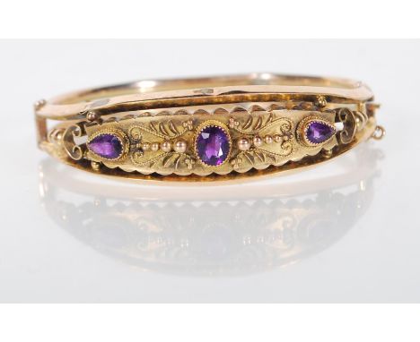 Victorian 19th century 9ct gold and amethyst bracelet with filigree worked detail having inset pear shaped and oval cut ameth
