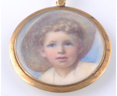 A London hallmarked 18ct gold pendant pictorial portrait on ivory locket. The locket with portrait of young child being of ro