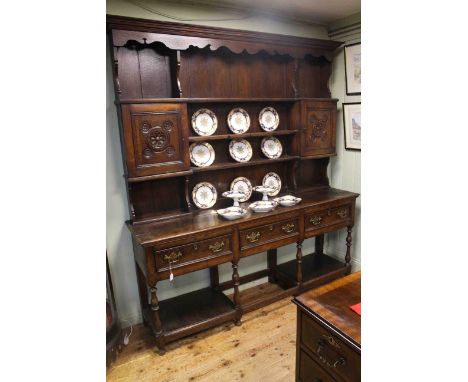Oak dresser, the cupboard and shelf back above three drawers with potboard below, 222cm x 196cm