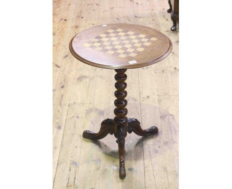 Circular snap top games table on twist pedestal tripod base