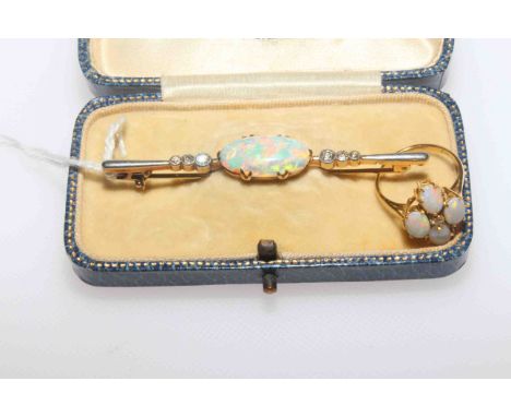 Handsome oval opal and diamond set two colour bar brooch, boxed, together with 18 carat gold opal ring (2)