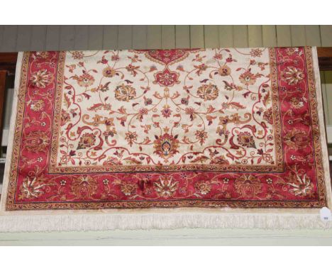 Keshan carpet with a beige ground, 2.30 x 1.60m