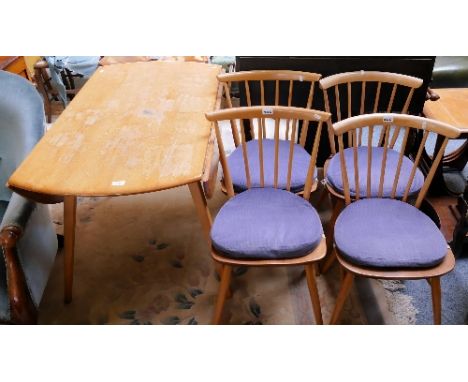 An Ercol dining suite, consisting of drop-leaf table, 4 matching stick back chairs (5)