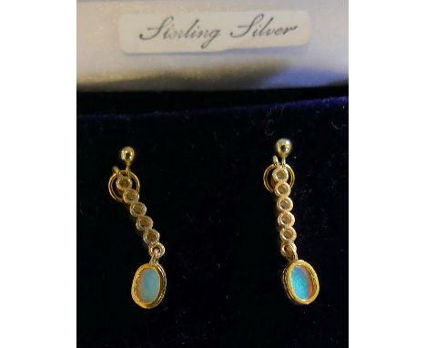 Gold on silver pair of opal and cubic zirconia drop earrings