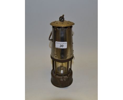 A steel and brass miners lantern, cartouche missing 