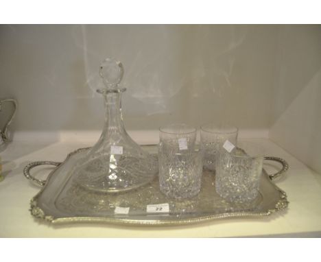 A silver plated twin handled tray; chased and engraved overall; a cut glass ships decanter; whisky tumblers (6)