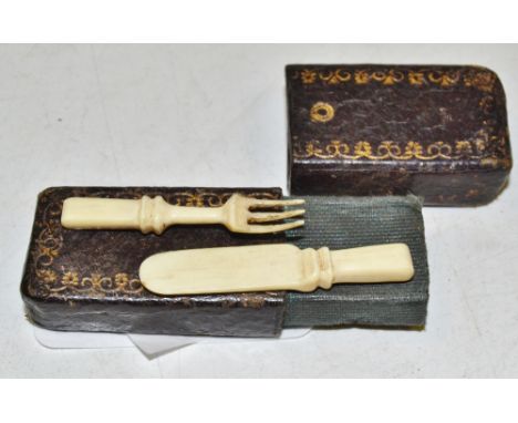 A miniature cased knife and Fork