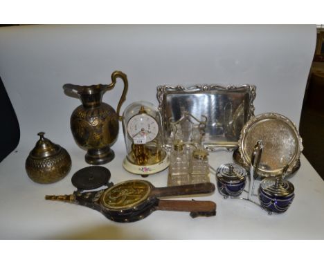 A Koma Anniversary clock; an EPNS mounted four piece cruet set; horse brasses ; bellows;  etc 