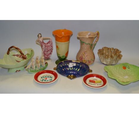 Decorative Ceramics - a novelty toast rack in the form of a boat, possibly Shorter; two Wade advertisement plates featuring G