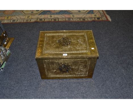 A mid 20th century embossed brass log bin; a framed print 