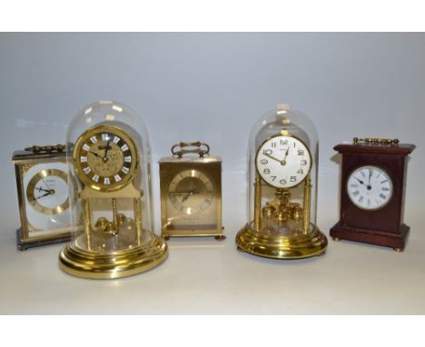 A Bentima Anniversary clock , under dome; another; a Eurastyle quartz carriage clock; others (5)