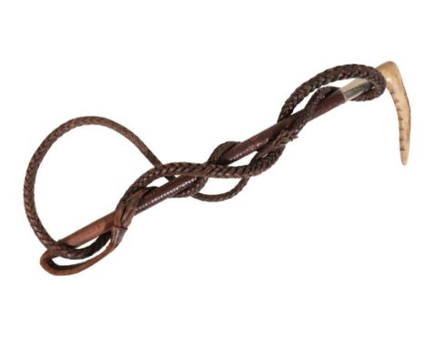 SWAINE & ADENEY, LONDON: A LADY'S HUNTING CROP with antler handle, silver collar, plaited leather shaft and thong, 46cm longP