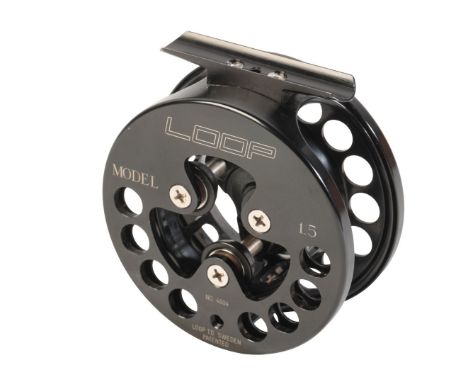 A LOOP MODEL 1.5 TROUT FLY REEL no. 4604, in the original Loop reel pouchProvenance: A private Hampshire fishing tackle colle