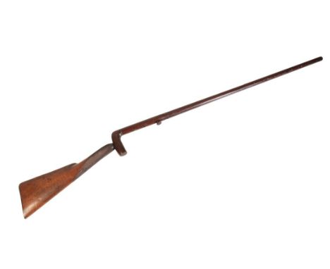 A 24 BORE PERCUSSION "WALKING STICK" GUN with chequered walnut stock, hidden trigger and grooved damascus single barrel, 118c