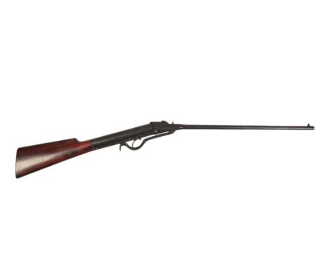 A .177 AIR RIFLE with walnut stock, underlever break barrel action, the steel butt plate stamped "M", no. 4516, 92cm longNote