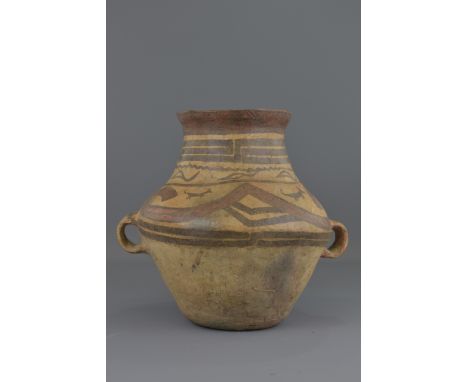A Chinese Neolithic period painted pottery jar. (10th to early millennium BC).31 cm tall   Provenance: From a respectable fam