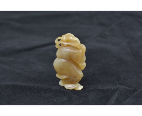 A Chinese jade carving of a child. 4.5 cm.