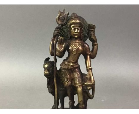 BRASS INDIAN FIGURE, LATE 19TH CENTURY the figure posed with a shield and fork, along with a white metal bellQty: 2