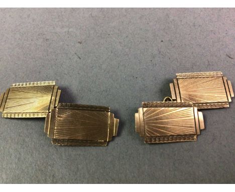 PAIR OF CUFFLINKS AND TWO BANGLES IN NINE CARAT GOLD  the cufflinks with Art Deco engine turned decoration, one bangle in thr