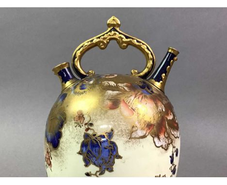 ROYAL WORCESTER POT, EARLY 20TH CENTURY  of ovoid shape with central handle and two spouts, decorated in the imari palette wi