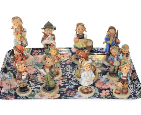 Twelve Hummel children figures