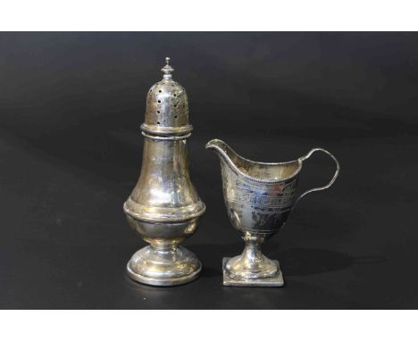 Georgian silver helmet-form cream jug and a silver sugar caster (2)