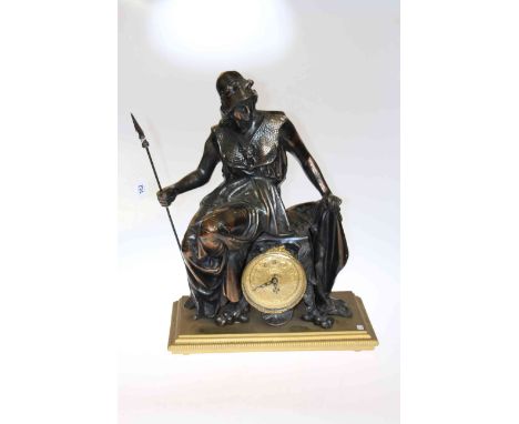 Spelter figure mantel clock with gilt dial on giltwood base