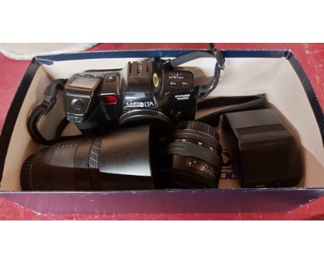 A Minolta 700 camera - sold with two lenses, etc.